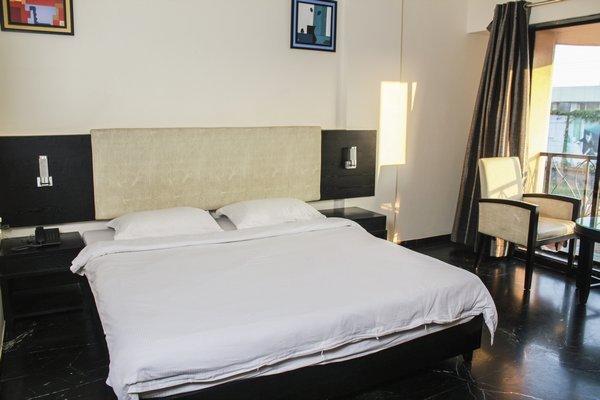 Hotel Aristro Lonavala Quarto foto